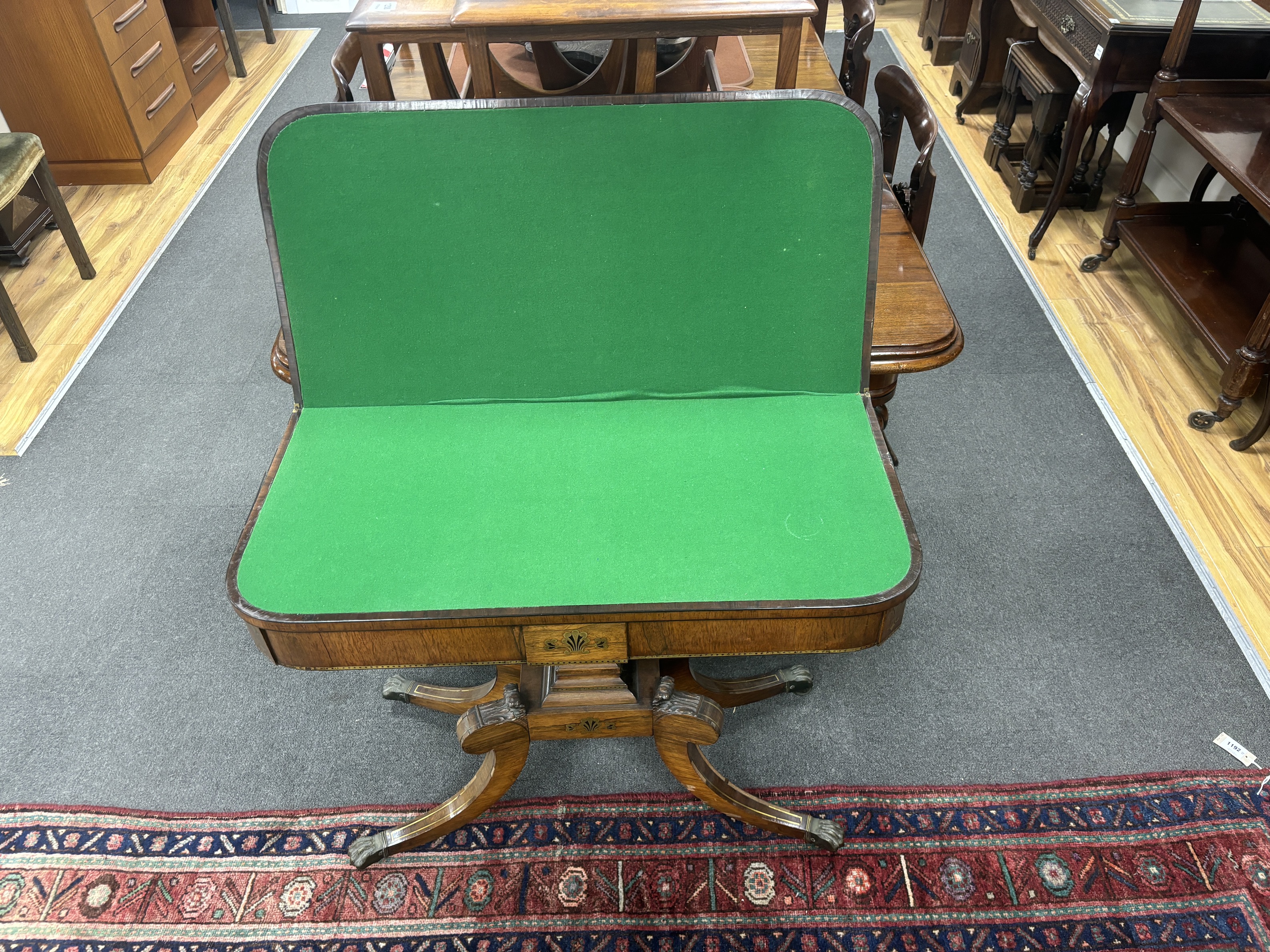 A Regency brass inlaid rectangular rosewood folding card table, width 91cm, depth 45cm, height 74cm
